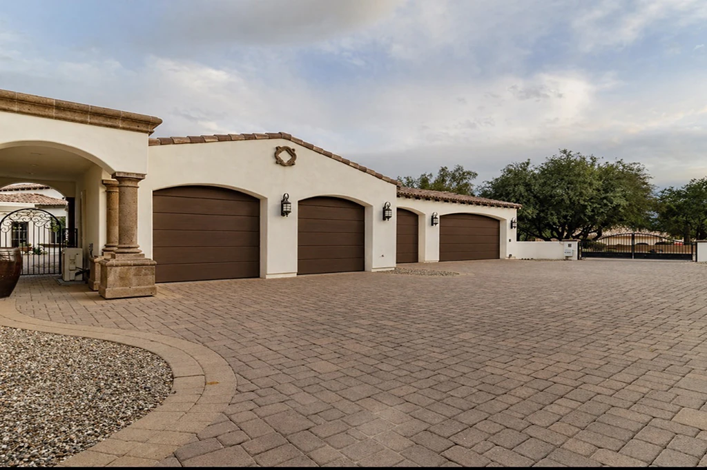 Motor court and five-car garage exterior