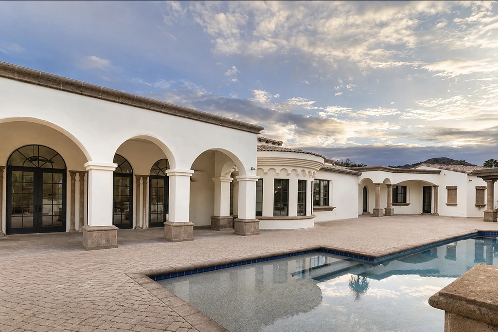 Pool terrace with arched exterior arcade