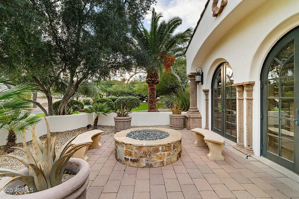 Private courtyard fire pit with desert landscaping