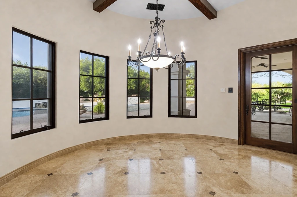 Breakfast rotunda with chandelier and pool views