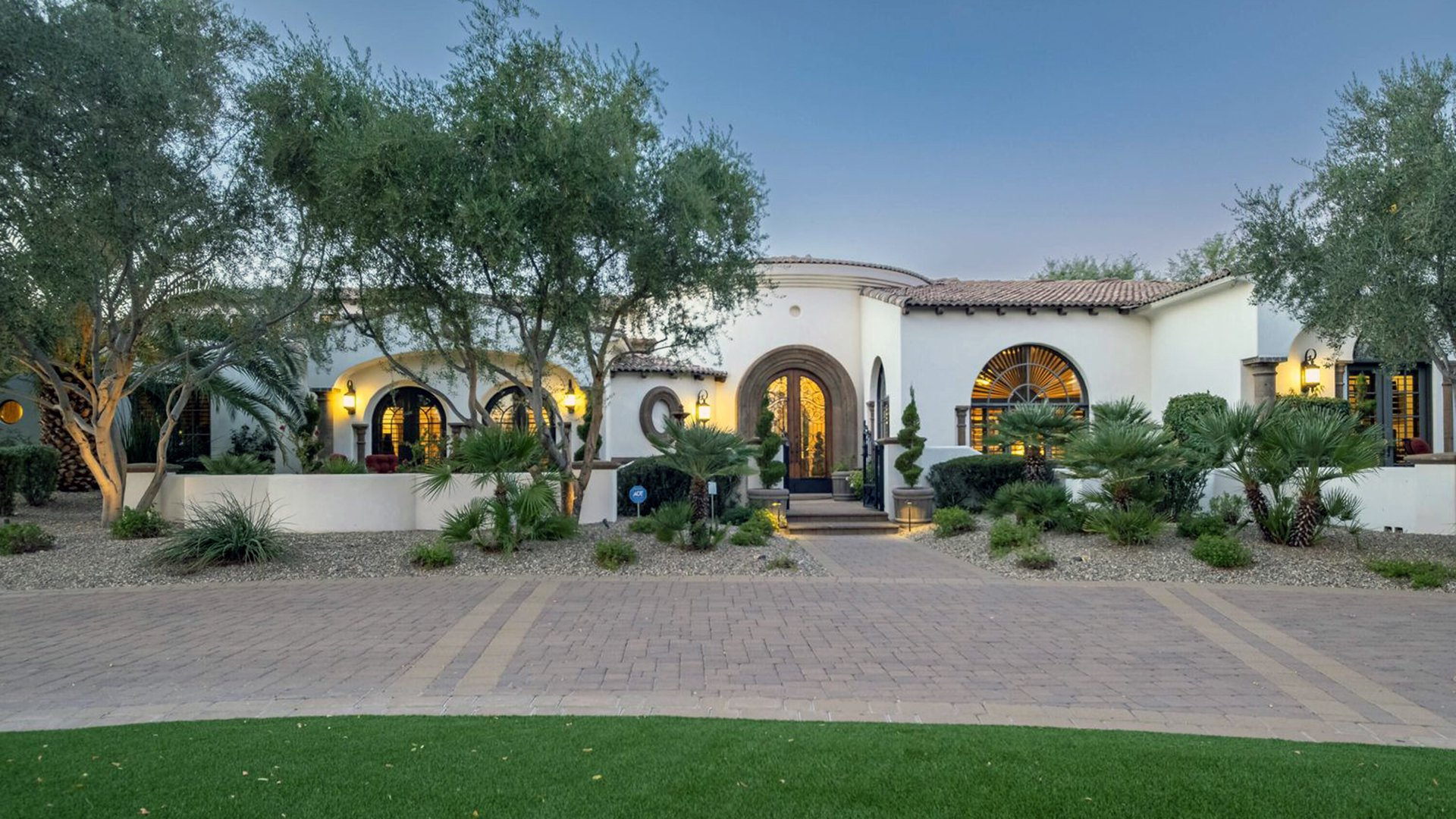 Estate driveway - with desert landscaping and lawn